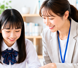 家庭教師と一緒に笑顔で勉強する女子中学生
