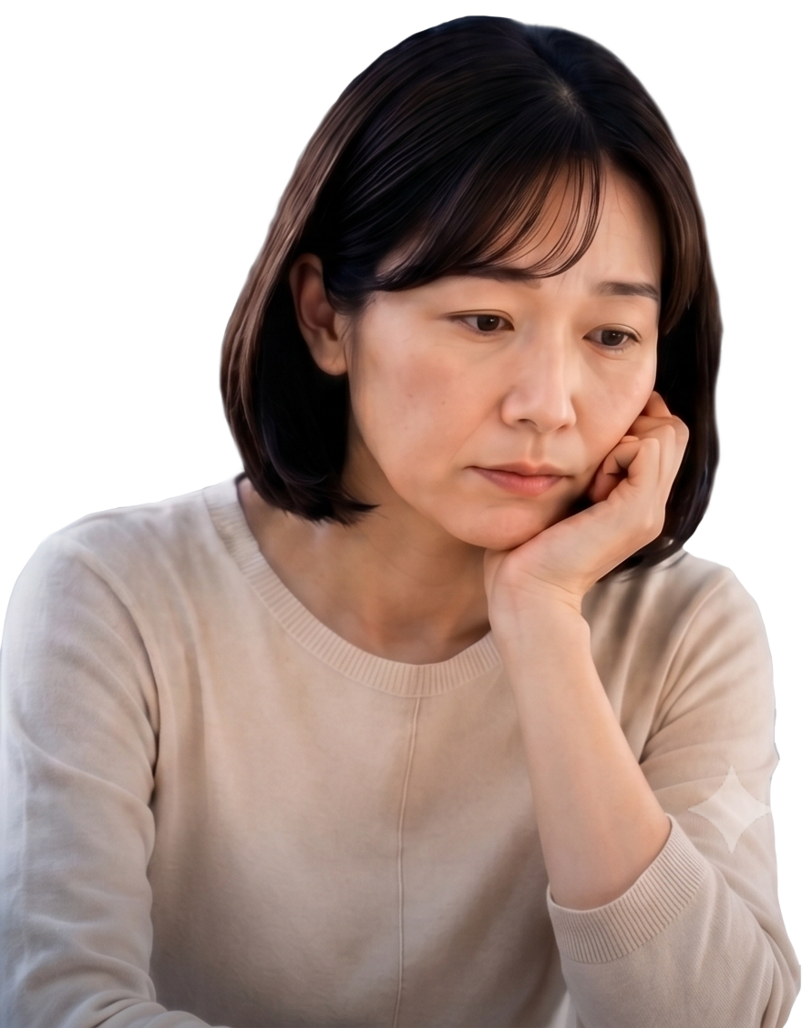 不安そうな表情で悩むお母さん